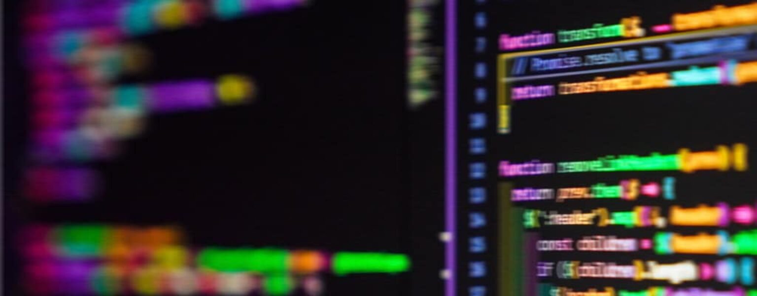 A hacker using a computer to steal data