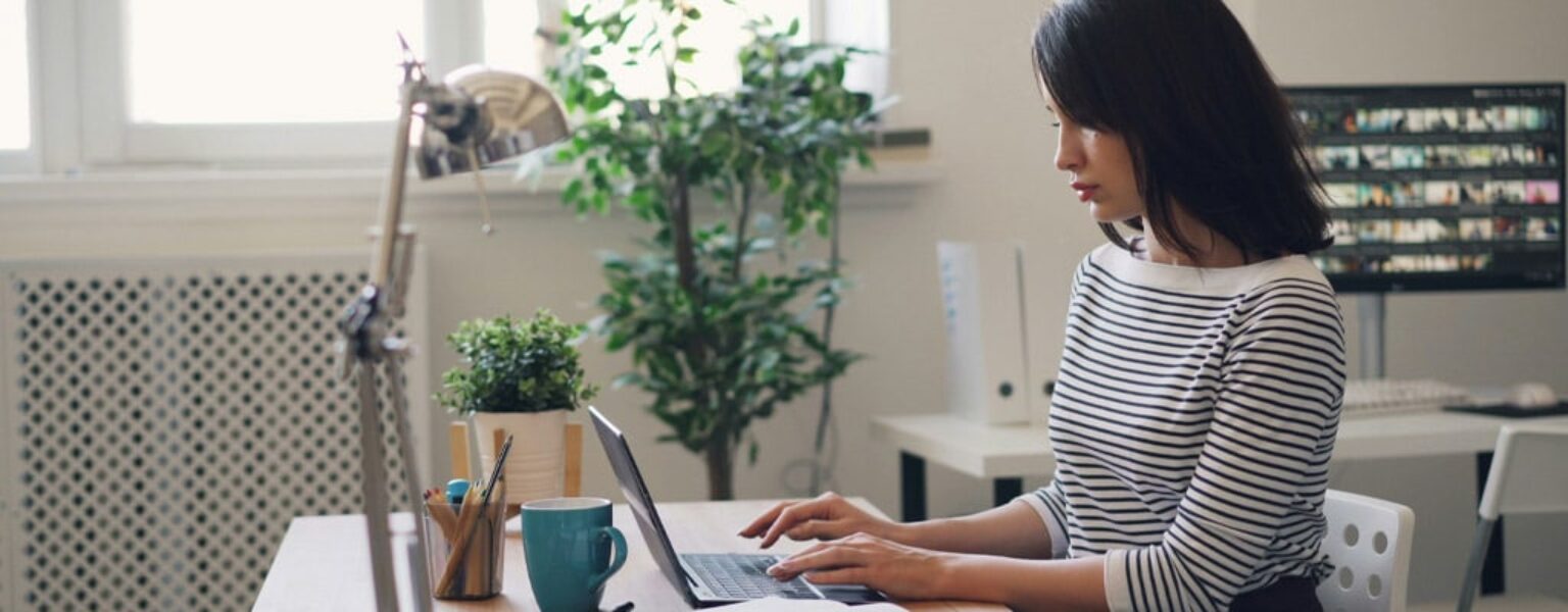 Woman doing document management in an insurance office