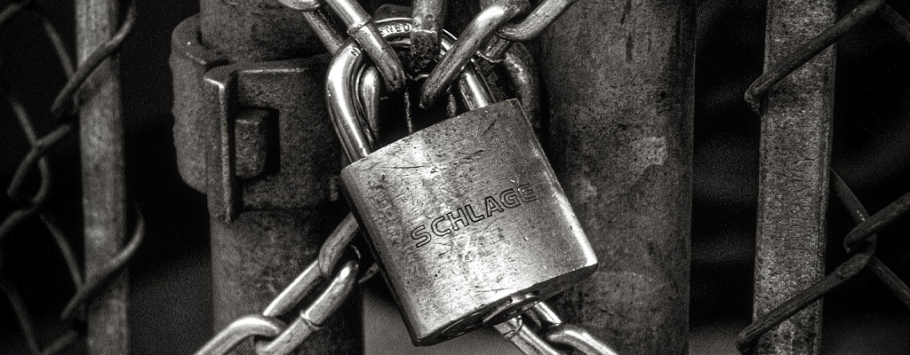 Lock on a gate eluding to Xerox printer security