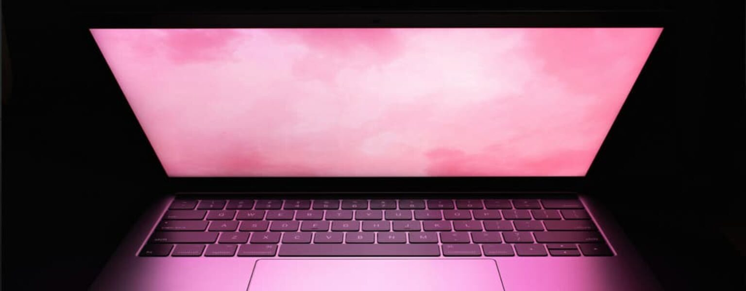 A laptop open on a desk