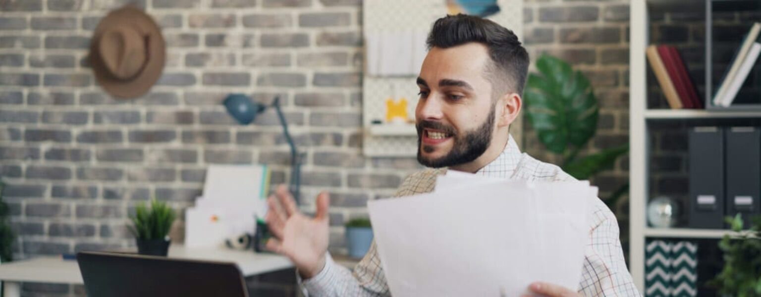 A frustrated man wanting to replace a copier machine