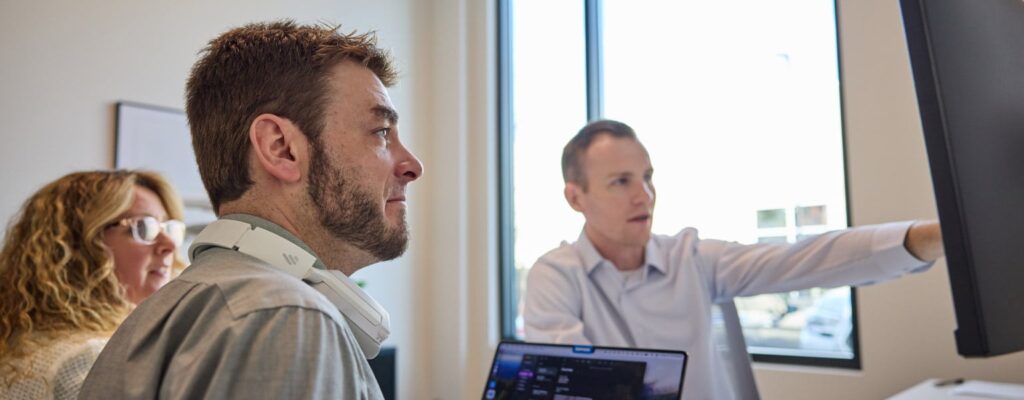 Man reviewing IT Security Audit with clients